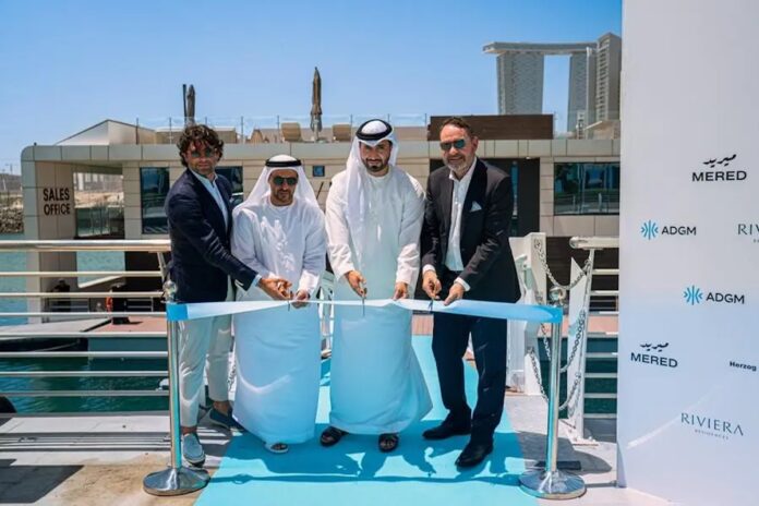 Ribbon-cutting ceremony marking the launch of MERED’s floating gallery on Al Reem Island | Rental Living News